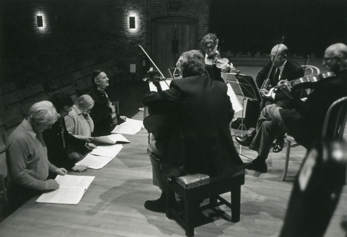 Peter Pears, Colin Matthews, Imogen Holst and Donald Mitchell with the Amadeus String Quartet during rehearsals for the premiere of Britten’s String Quartet No. 3, Snape Maltings, December 1976