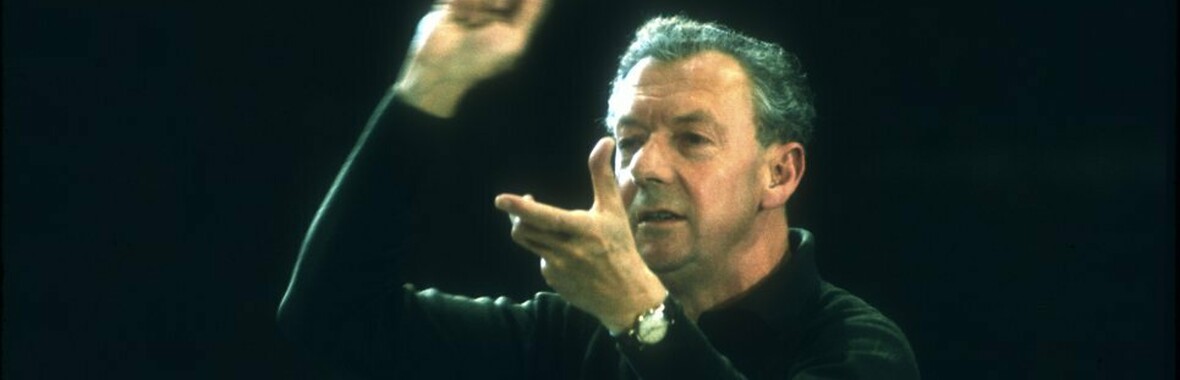 Benjamin Britten conducting orchestra