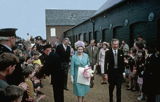 Queen Elizabeth II walking with Benjamin Britten